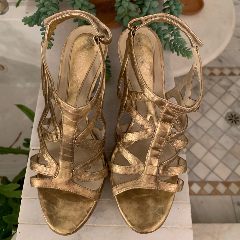Strappy gold sling back heels